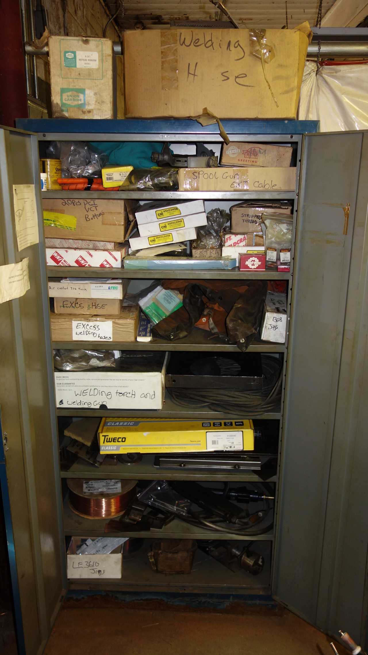 CABINET WITH CONTENTS, ASSORTED WELDING SUPPLIES, WELDING WIRE, GUN ATTACHMENTS, TORCHES, HOSES, CABLES, SAFETY HELMETS COVERALLS,  ELECTRODES, REGULATORS, CNI, UNION CARBIDE, LTECH, TWECO - WELDING EQUIPMENT