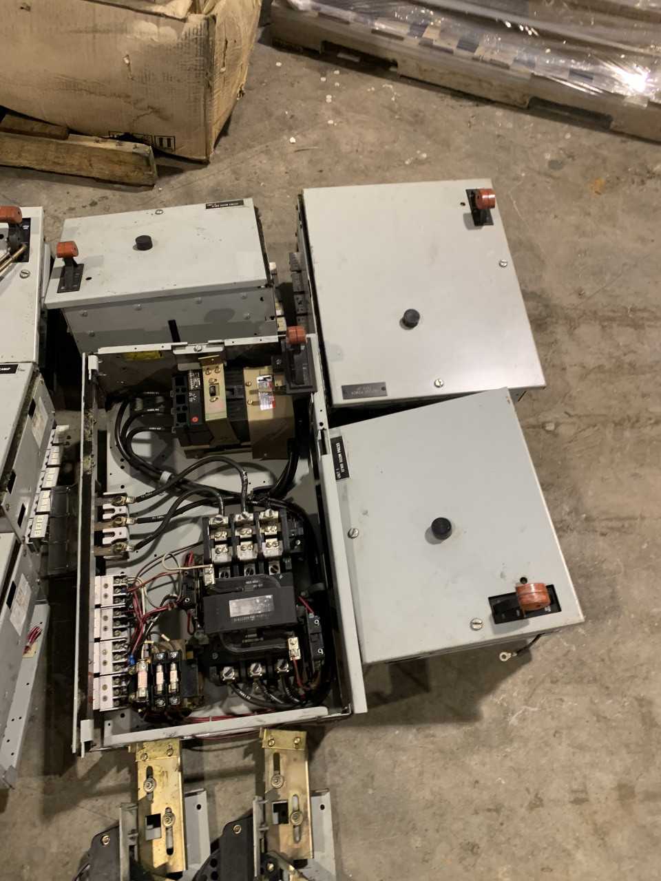 LOT OF GENERAL ELECTRIC MCC BUCKETS WITH BREAKERS AND STARTERS - MOTOR CONTROL CENTERS