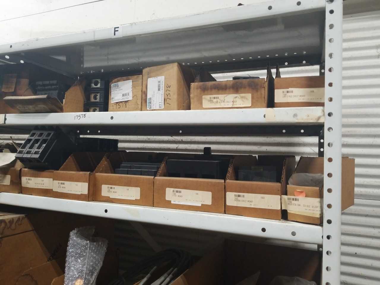 CONTENTS OF 2 SHELVES , SQUARE D BREAKERS, MOTOR BRUSH, SIEMENS BREAKERS - MISCELLANEOUS