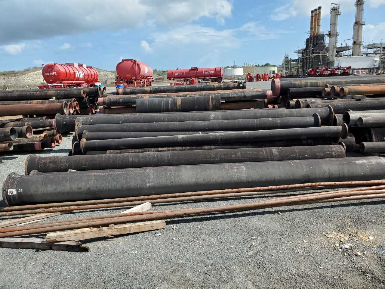 ROW OF ASSORTED US PIPE TYTON JOINT DUCTILE IRON PIPES, 8IN, 10IN, 12IN, 14IN, 16IN, 18IN, 24IN - HAND TOOLS