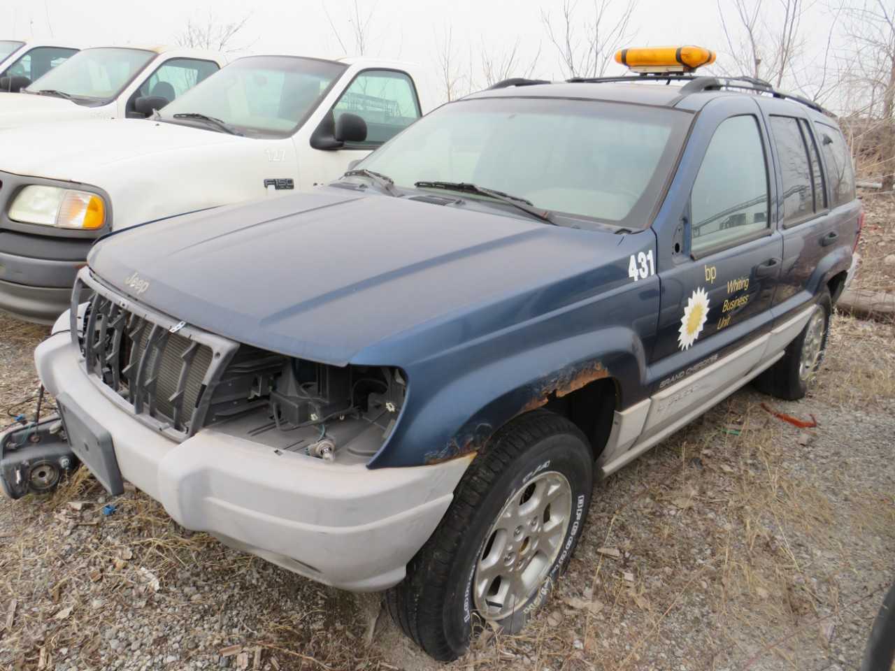 2000 JEEP GRAND CHEROKEE LAREDO 4WD 4 DOOR V6 CYL GAS JEEP  VIN:  1J4GW48S0YC231687 - BUSES