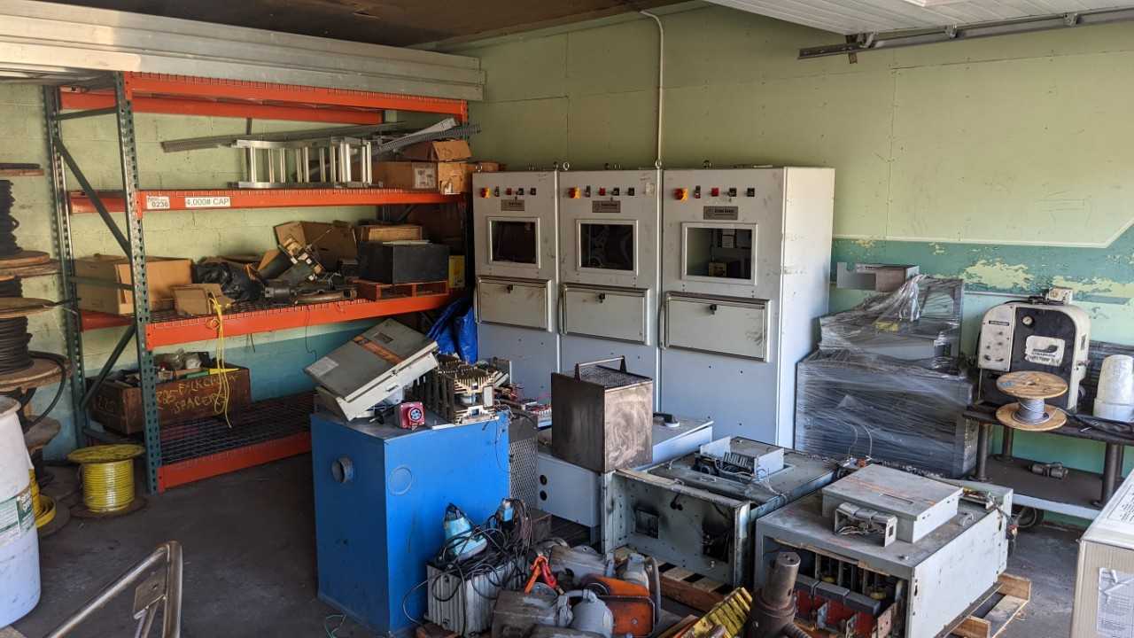 Lot of remaining 5 sections of racking content and floor content in room - INDUSTRIAL PARTS
