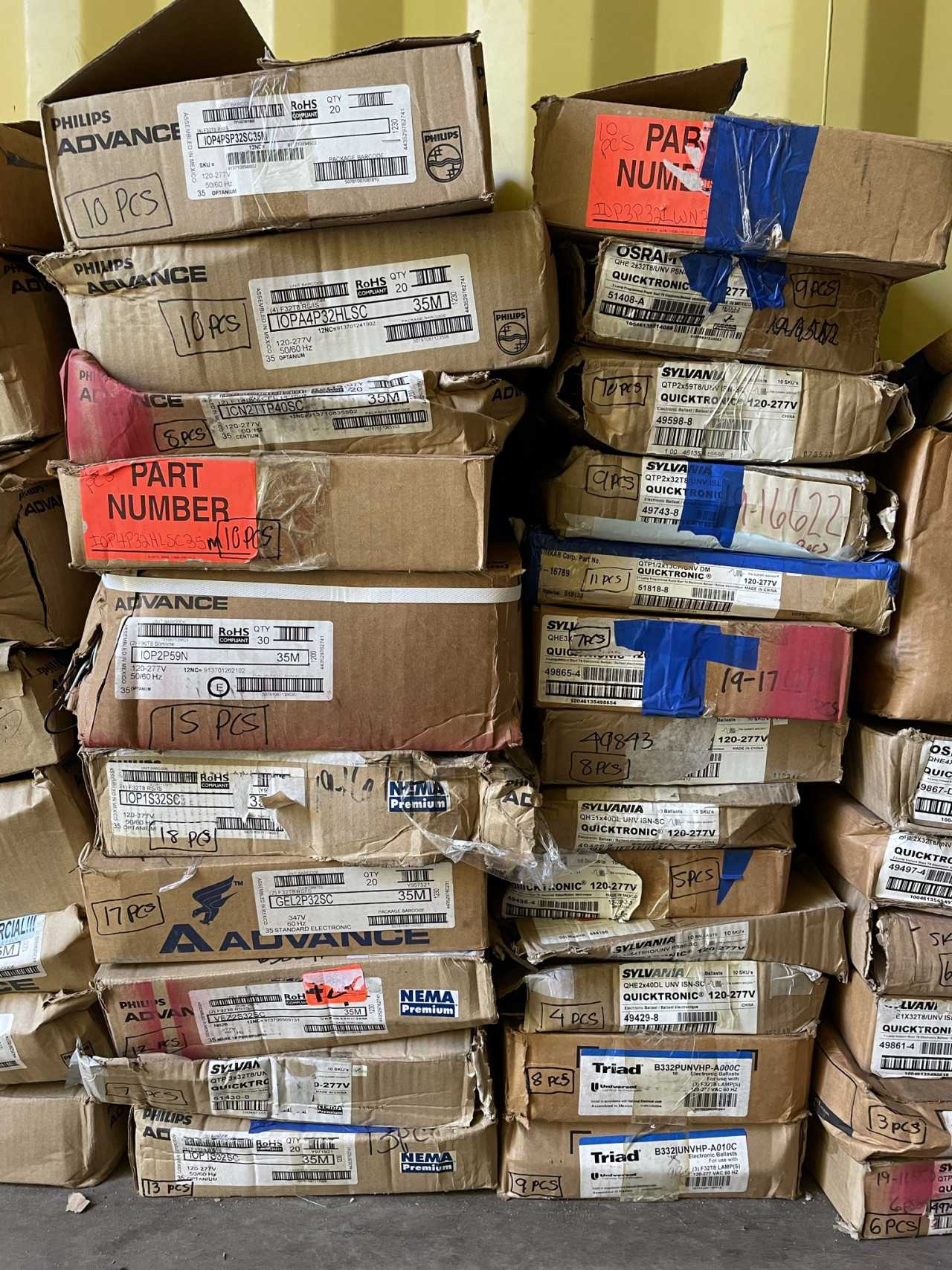 Lot of Approximately 1,200 New and Unused Fluorescent Lighting Ballasts from Philips, Keystone, Universal and Quicktronic - LIGHTING