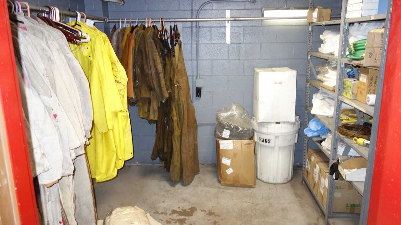 CONTENTS OF ROOM, CARHART COVERALLS, LEATHER JACKETS AND OVERALLS, RAGS, DUST SUITS - SAFETY EQUIPMENT