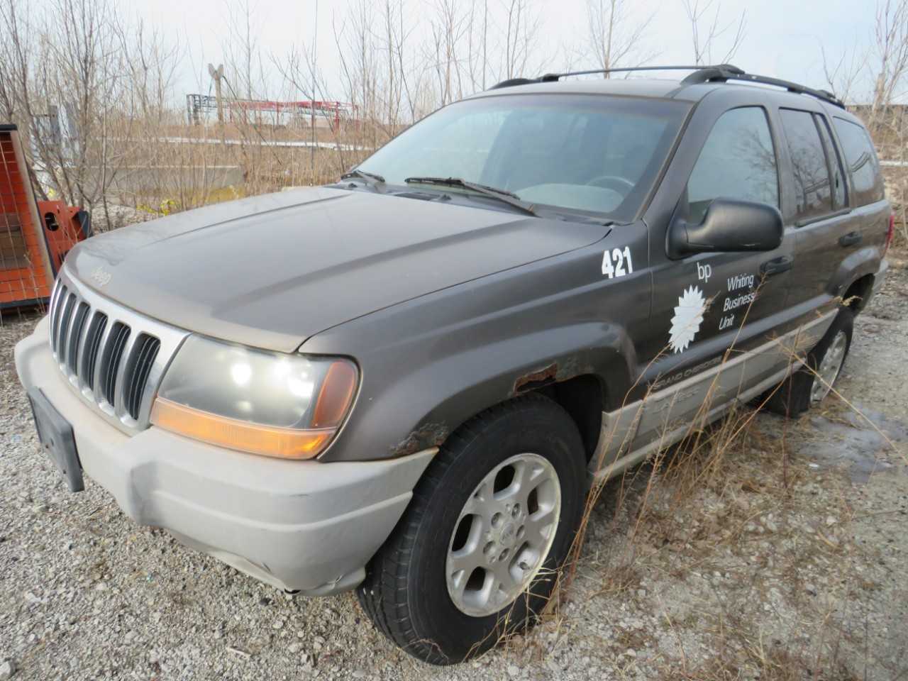 JEEP GRAND CHEROKEE LAREDO 2000 4.0L 4 DOOR V6 CYL GAS JEEP  VIN:  1J4GW48SXYC224701 - BUSES
