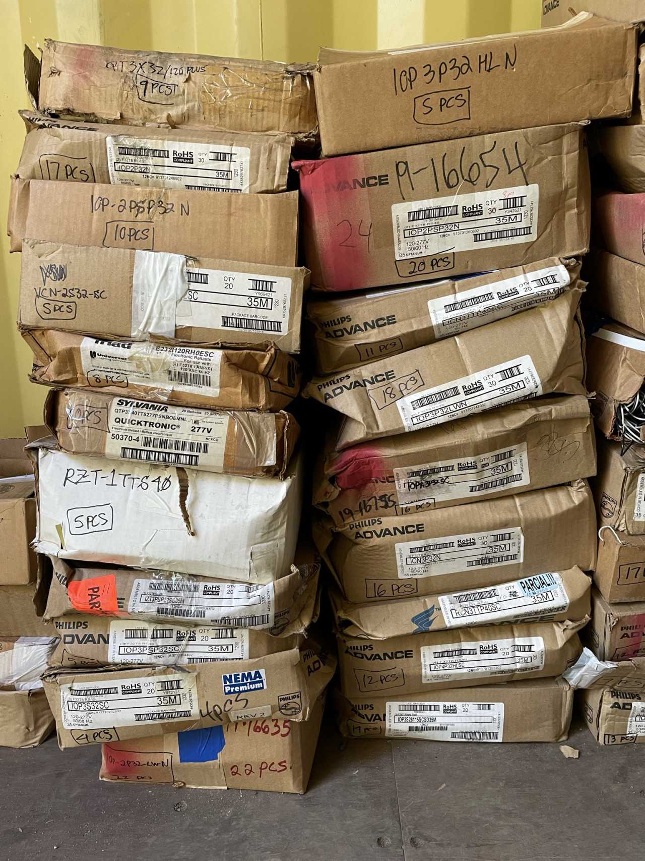 Lot of Approximately 1,200 New and Unused Fluorescent Lighting Ballasts from Philips, Keystone, Universal and Quicktronic - LIGHTING