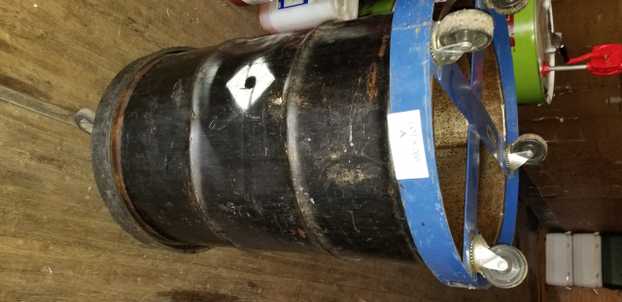 Oil Drum w/ Wheel Base (Empty) - TOOL STORAGE Oil Drum w/ Wheel Base (Empty) - TOOL STORAGE