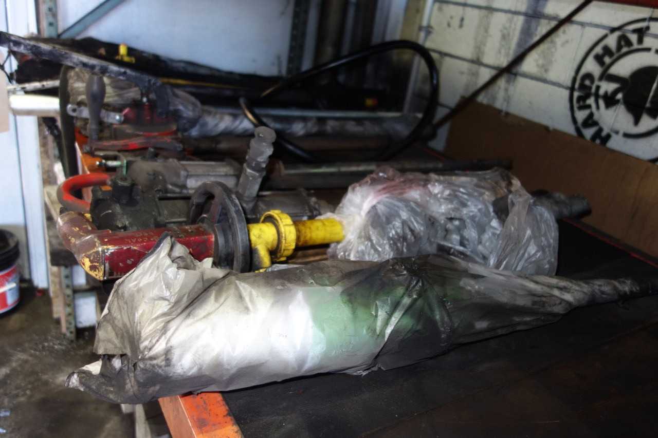CONTENTS OF SHELF, ASSORTED FUEL DRUM PUMPS - PUMPS