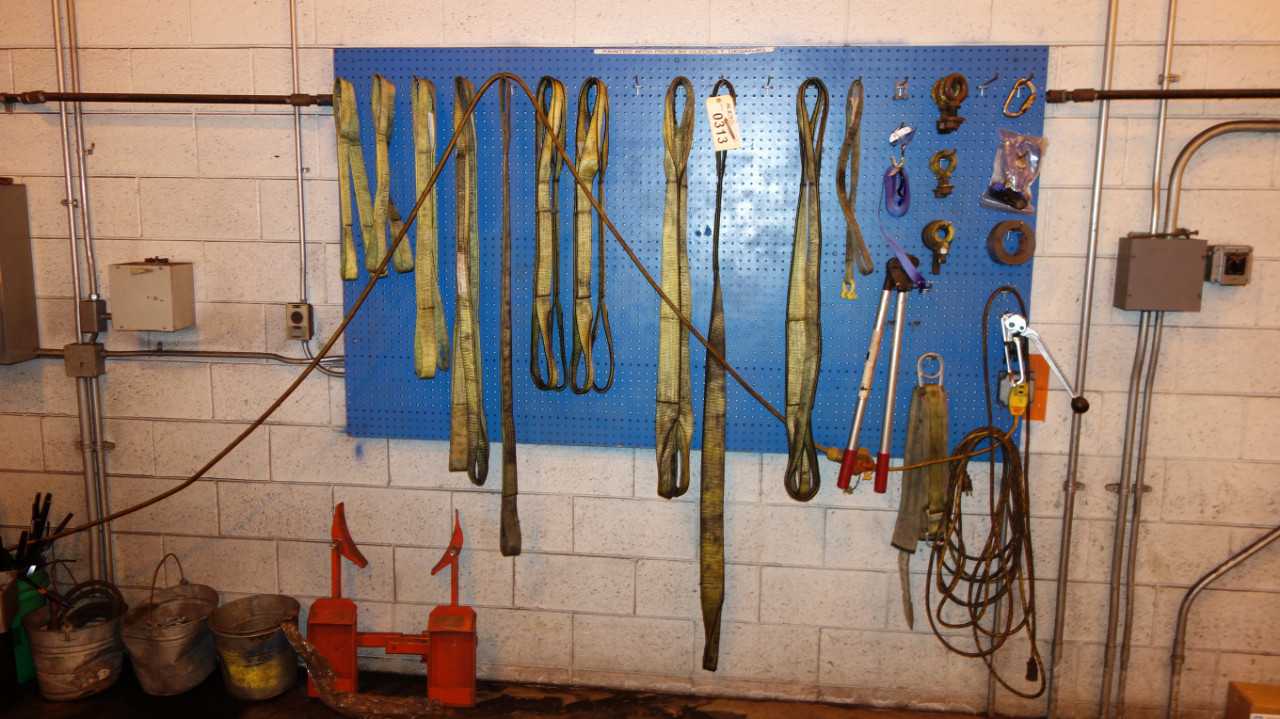 WALL OF ASSORTED SLINGS, RIGGING EQUIPMENT - LIFTING EQUIPMENT