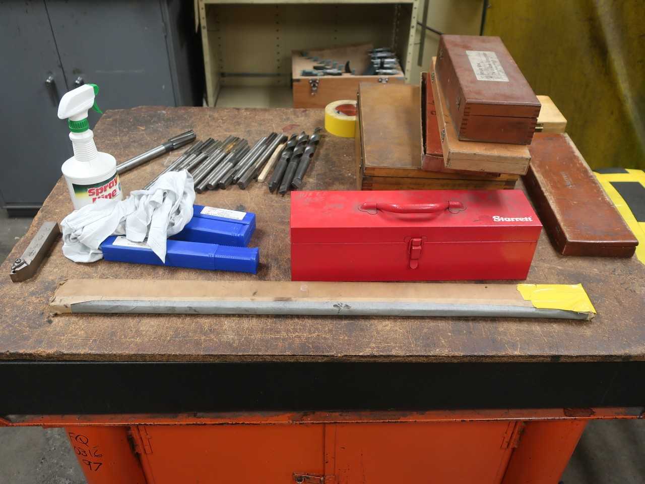 Steel work table with 36"x48" granite surface, micrometers, calipers, machining/milling bits - ELECTRIC POWER TOOLS