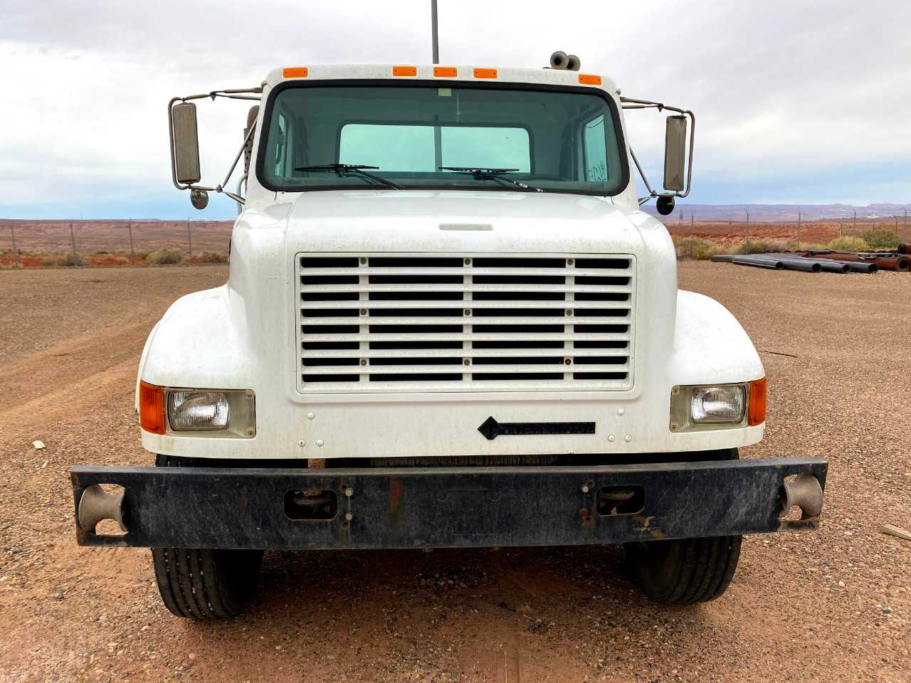 1999 International 4900 4X2 Cab Stake Bed Truck - HYDRO EXCAVATOR TRUCKS