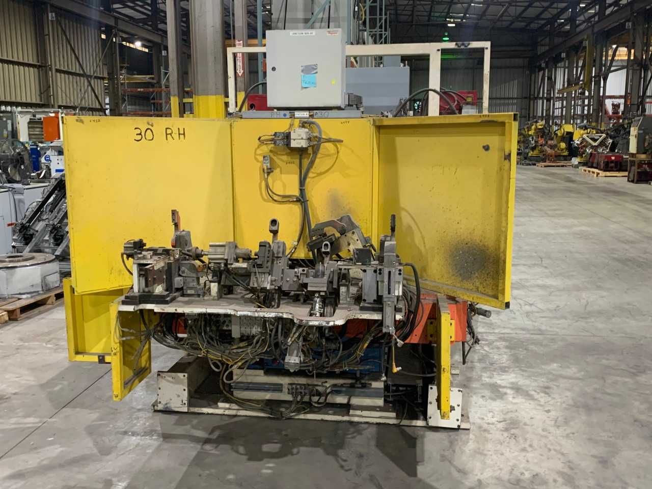 DUAL WELDING CELL W/ 100IB FANUC ROBOTS AND RJ3IB CONTROLLERS - INDUSTRIAL ROBOTS