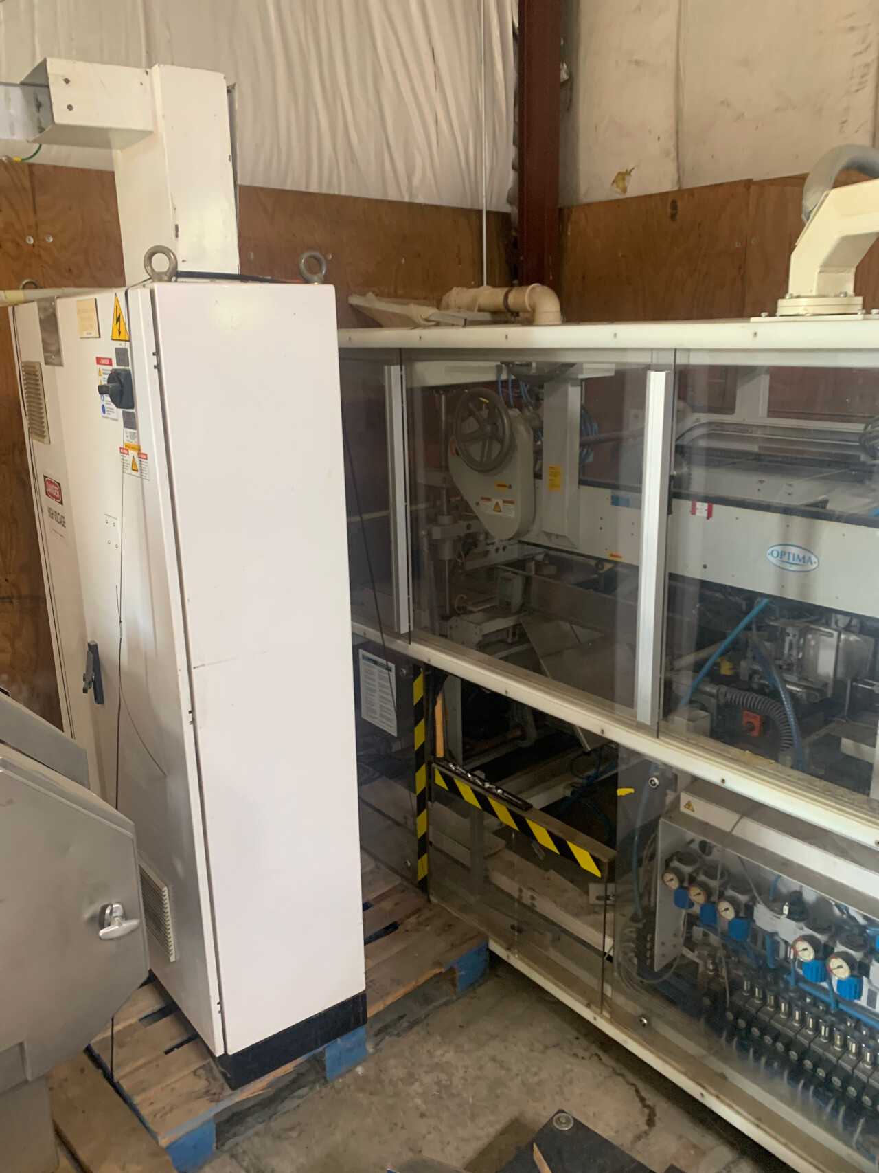 Optima Multipack Bagger Plus Equipment - Used only for about two years - PACKAGING