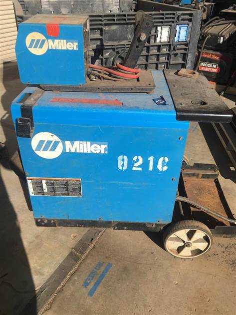 Miller 302 22A Welder - WELDING EQUIPMENT