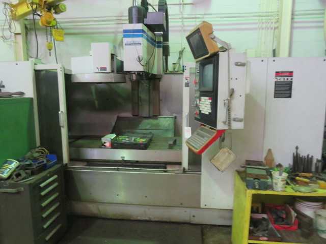 Fadal VMC 6030 and the tooling and cabinets in the pictures - VERTICAL MACHINING CENTERS