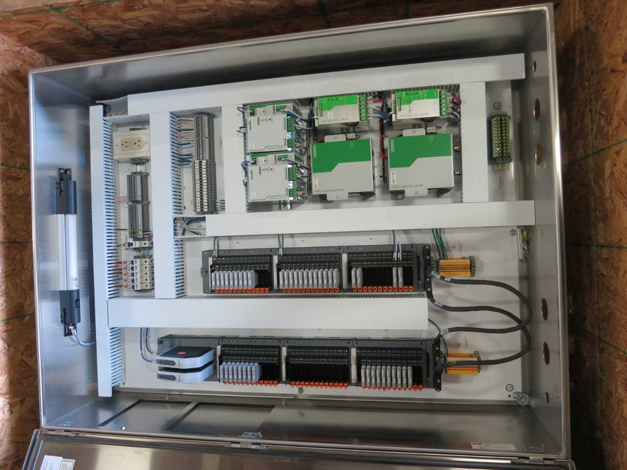 STAINLESS ENCLOSURE WITH ASSORTED EMERSON OVATION DCS MODULES AND PHOENIX CONTACT POWER SUPPLIES - AUTOMATION & CONTROLS
