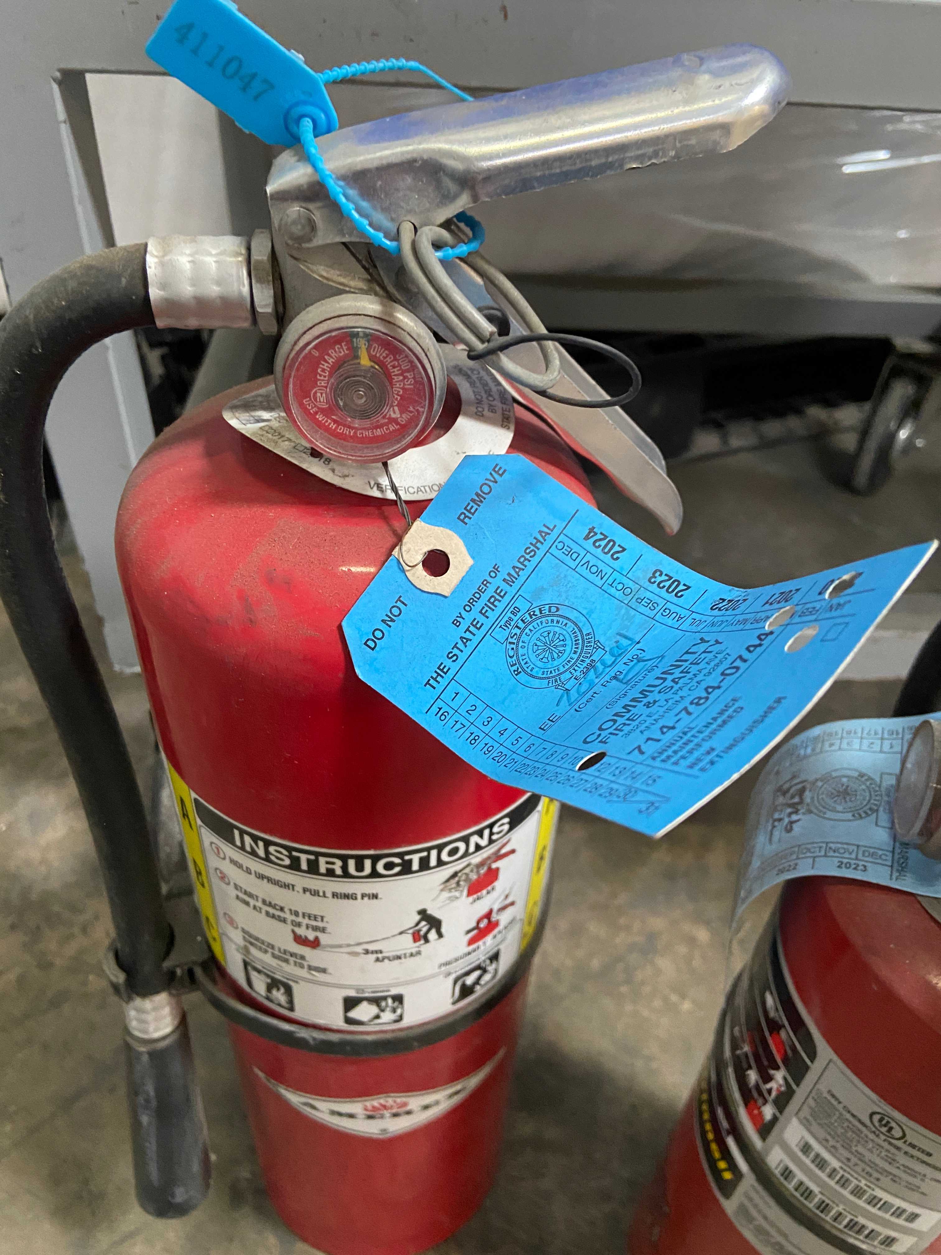 21 fire extinguishers; Amerex Model B402; fully charged - SAFETY EQUIPMENT