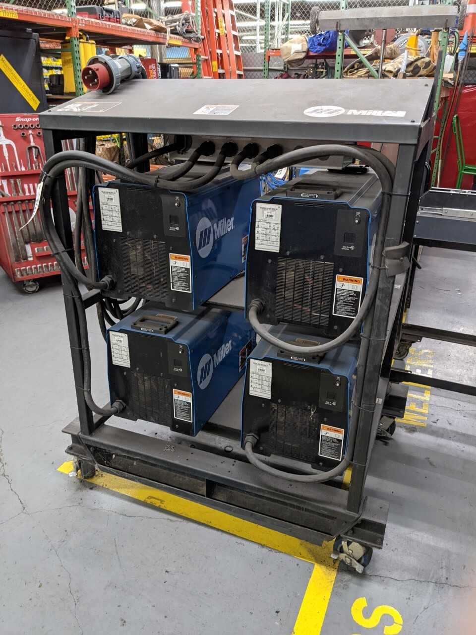 Miller 4 Pack Rack Welder with cart - WELDING EQUIPMENT