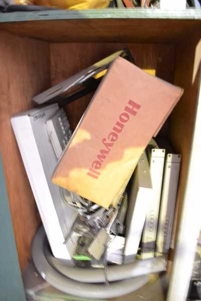 CABINET WITH HONEYWELL PRINTER PARTS, PANASONIC CONTROLS, LXE BATTERY ANALYZER (NOVA SCOTIA) - MISCELLANEOUS