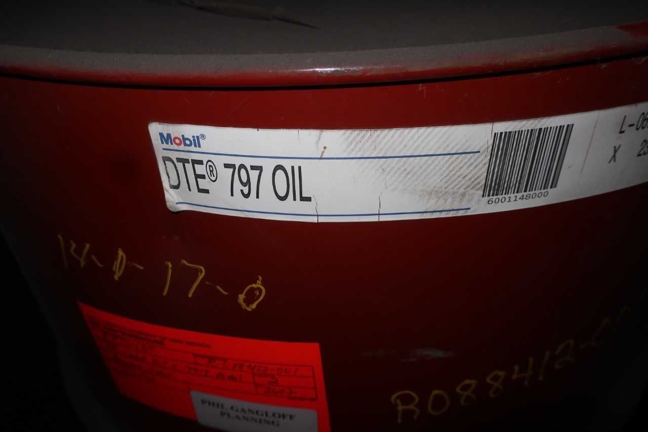 LOT OF 2 55 GALLON DRUMS OF MOBIL DTE 797 OIL - PALLET JACKS
