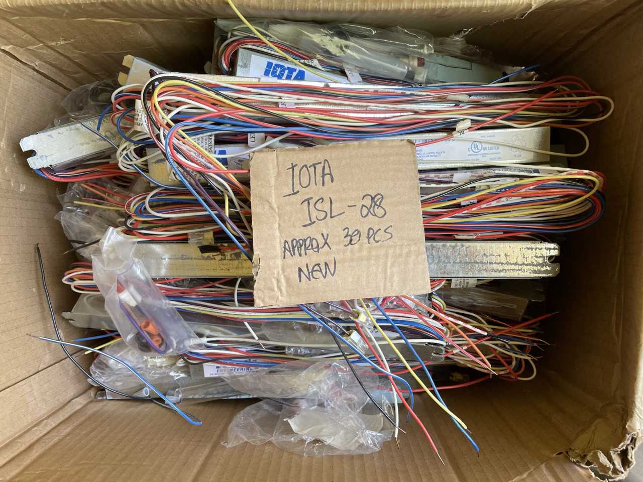 Lot of Approximately 120 New and Unused Fluorescent Lighting Emergency Backup Ballasts from Iota, Bodine and more - LIGHTING