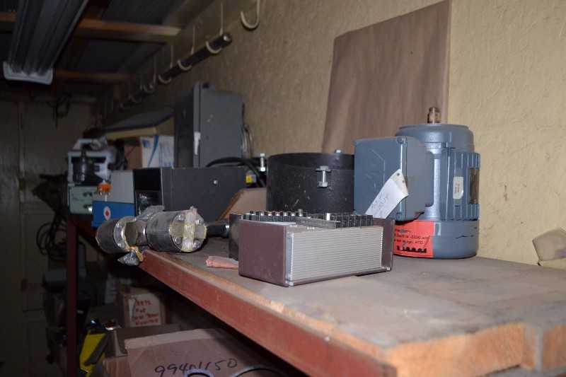 CONTENTS OF ROOM - BTG MEK-2200 TRANSMITTER, PCB BOARDS, SPARE PARTS - MISCELLANEOUS