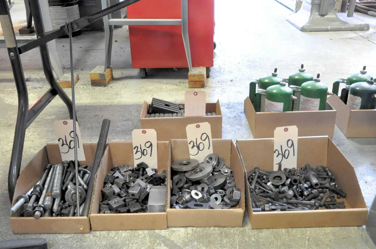 Lot-Hold Down Tooling in (4) Boxes on Floor Under (1) Table - ELECTRIC POWER TOOLS