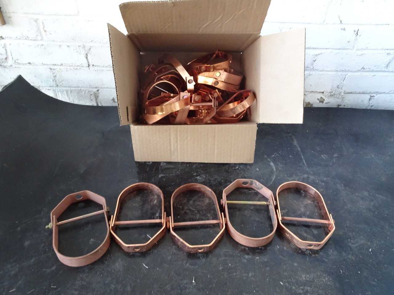 Approx 25, 3in copper Pipe hangers - WIRE MANUFACTURING