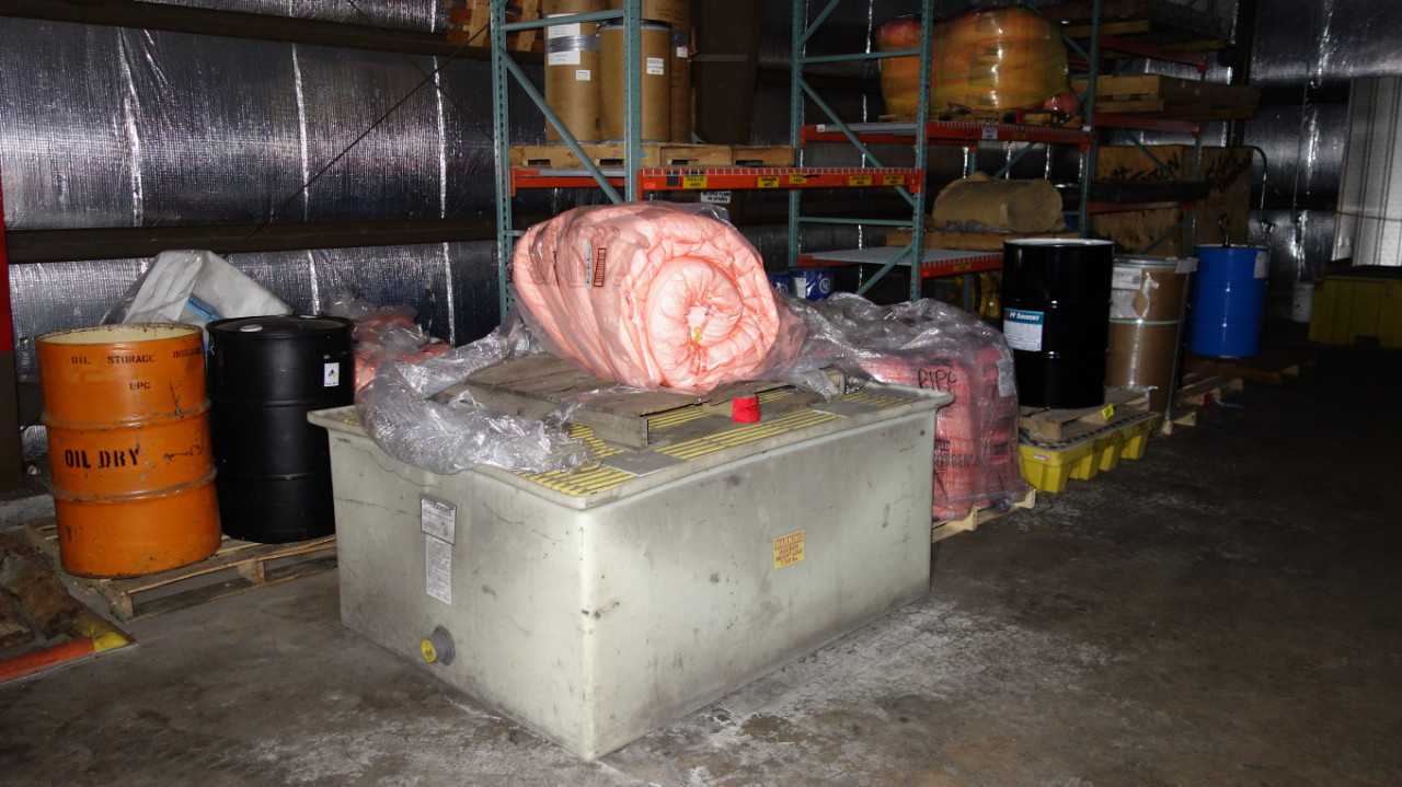 ASSORTED CONTENTS ON FLOOR, DRUMS, SORBENT BOOMS - PLANT & FACILITY