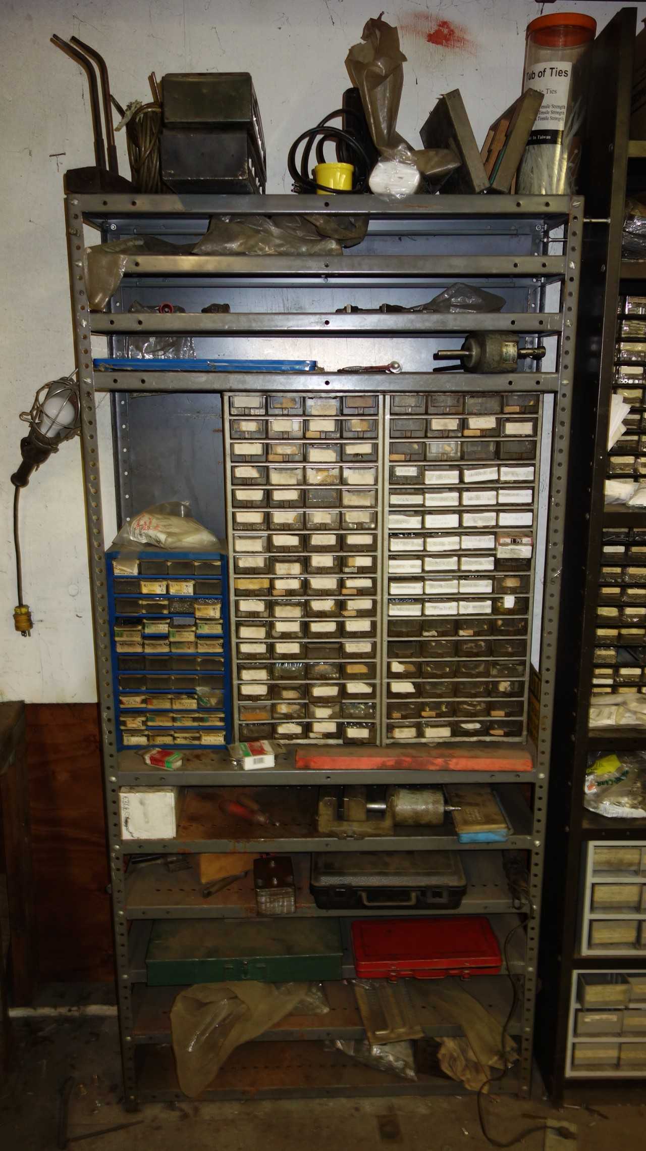 CONTENTS OF 2 SECTIONS OF SHELVING, ASSORTED HAEGAR HARDWARE FOR INSERTION MACHINE, NUTS, STUDS, FASTERNERS, PINS, GENERAL TOOLS, SOCKETS (GREEN TOOLBOX NOT INCLUDED)