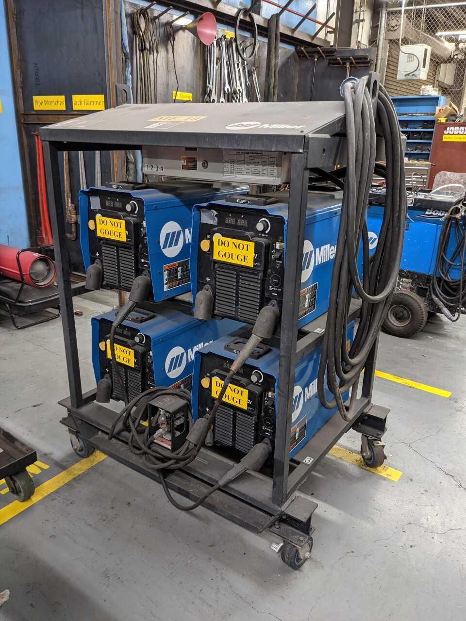Miller 4 Pack Rack Welder with cart - WELDING EQUIPMENT