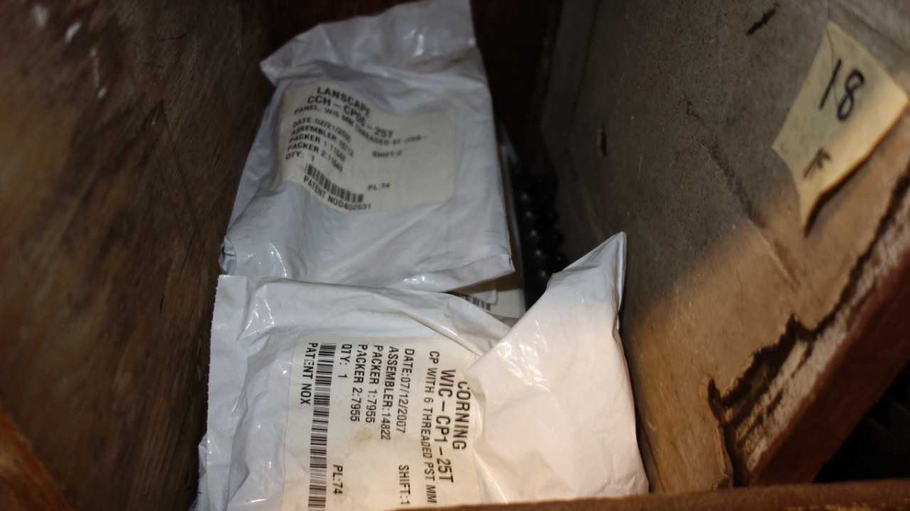 CONTENTS OF PIGEON HOLE CABINET, ASSORTED FIBER OPTIC CABLES, CLIPS, FIBER OPTIC ACCESSORIES - ELECTRICAL COMPONENTS