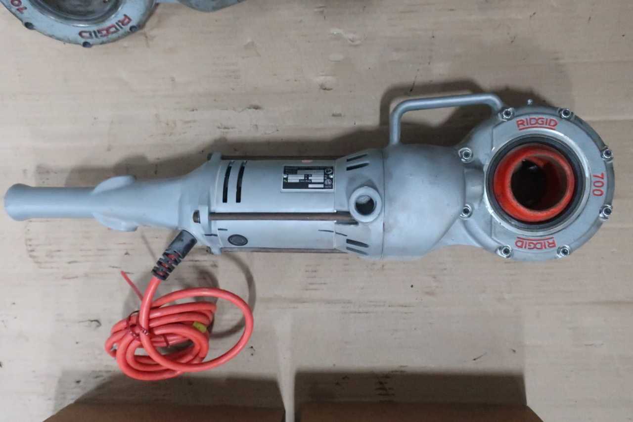 2 RIDGID 700-T2 PORTABLE PIPE THREADING MACHINES AND ASSORTED DIE HEADS - HAND TOOLS
