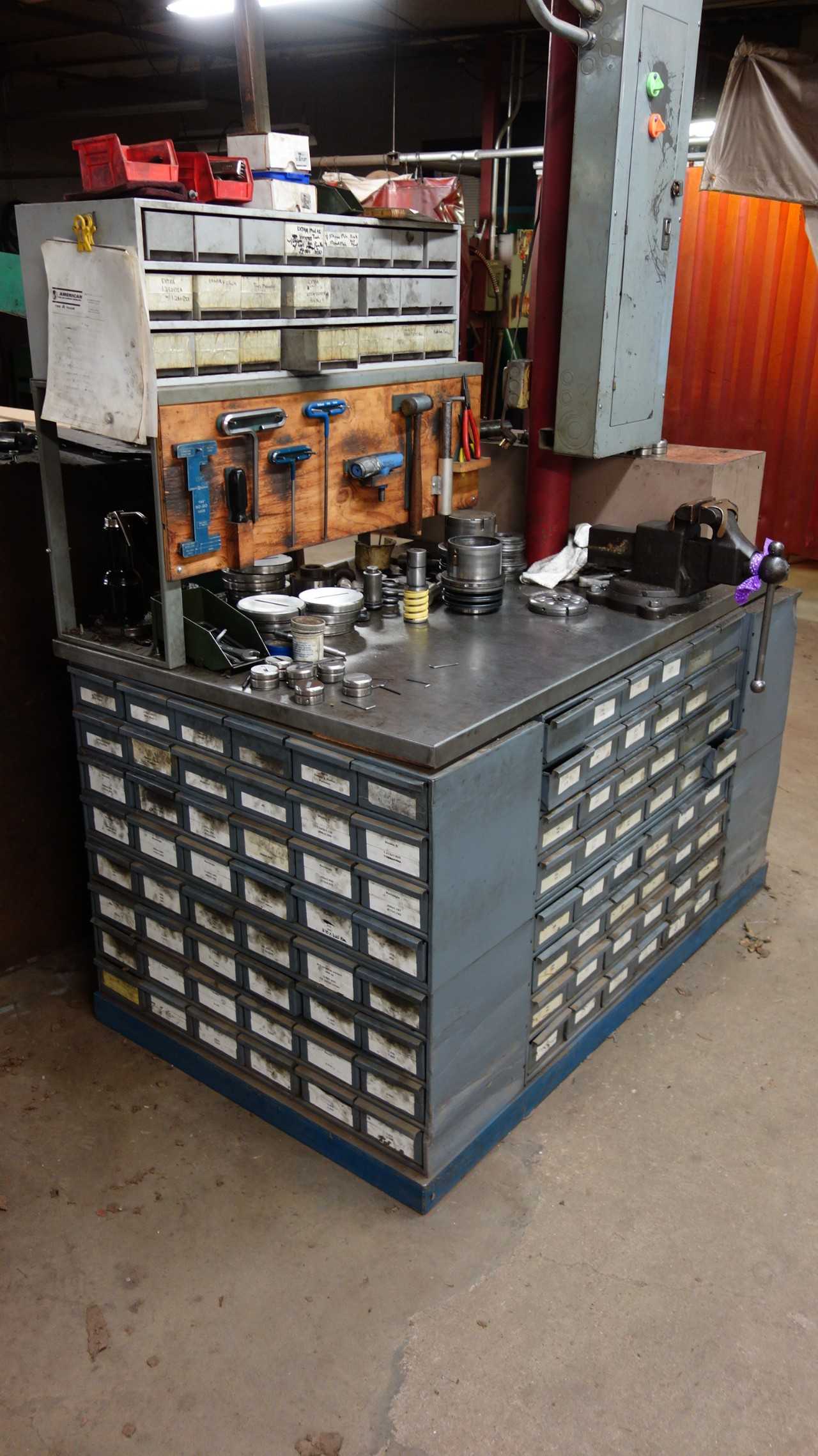 STRIPPIT PRESS PUNCHES & DIES WORK STATION, FULL SET OF PUNCHES AND DIES IN CABINET (DOES NOT INCLUDE TABLE VISE)