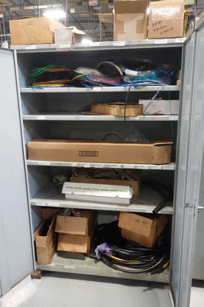 Cabinet with tubing, machine parts - TOOL STORAGE