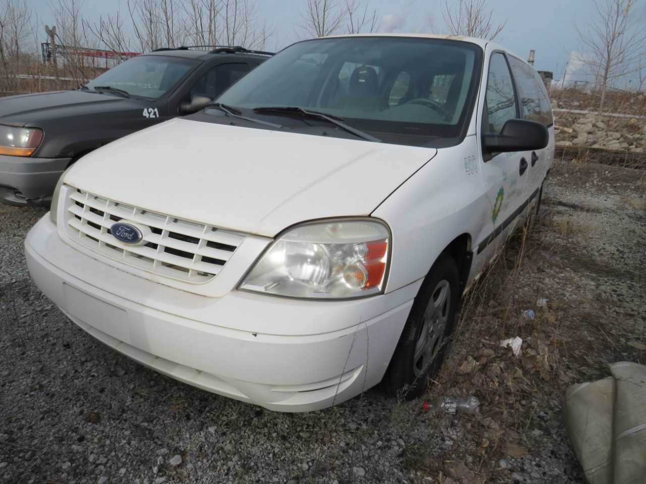 2005 FORD FREESTAR ADVANCETRAC FWD 4 DOOR V6 CYL GAS MINI-VAN  VIN:  2FMZA506X5BA60598 - BUSES