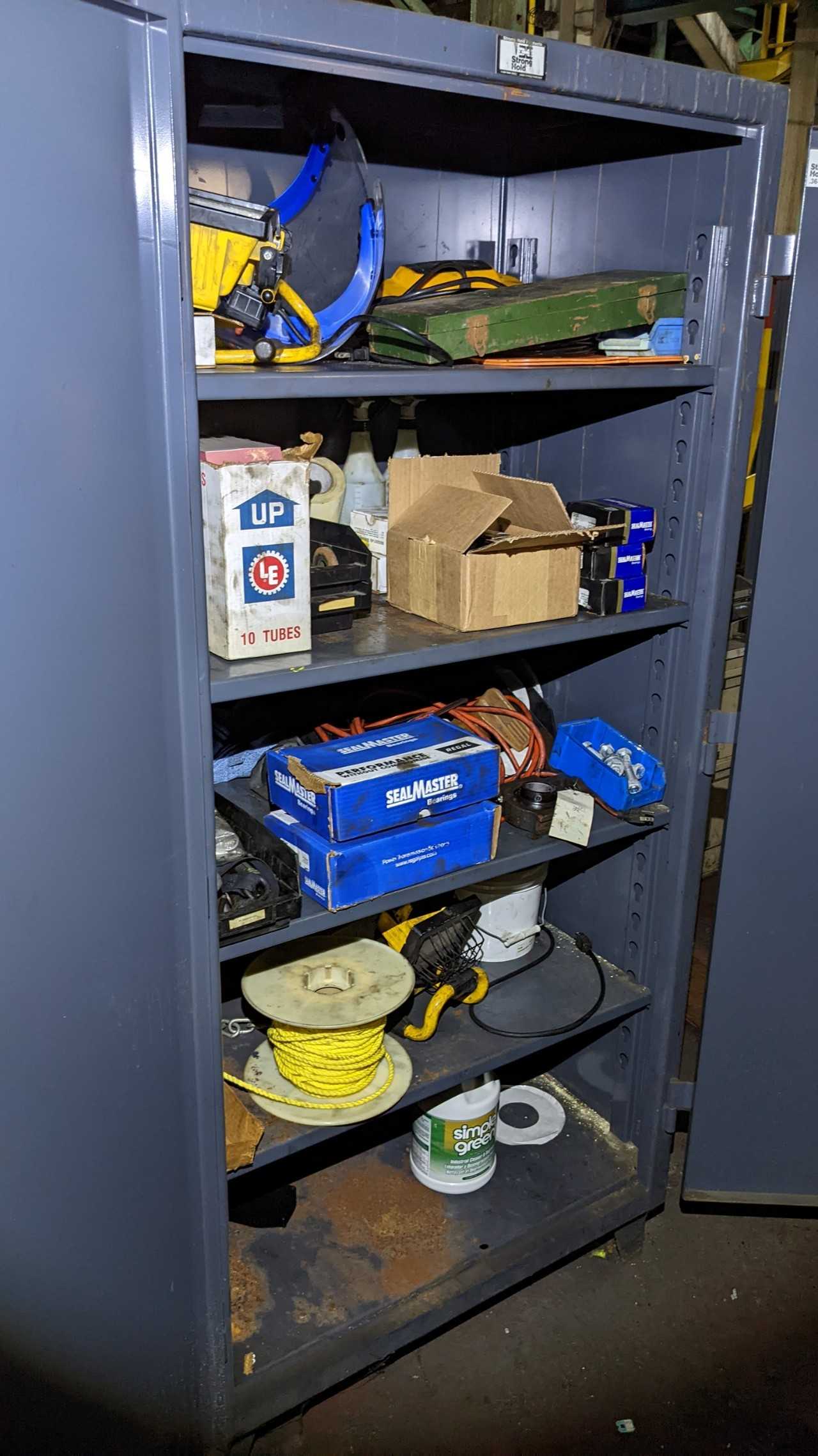 Strong hold 36-244G double door steel cabinet with contents. Seal master bearings, flood light and miscellaneous content - TOOL STORAGE