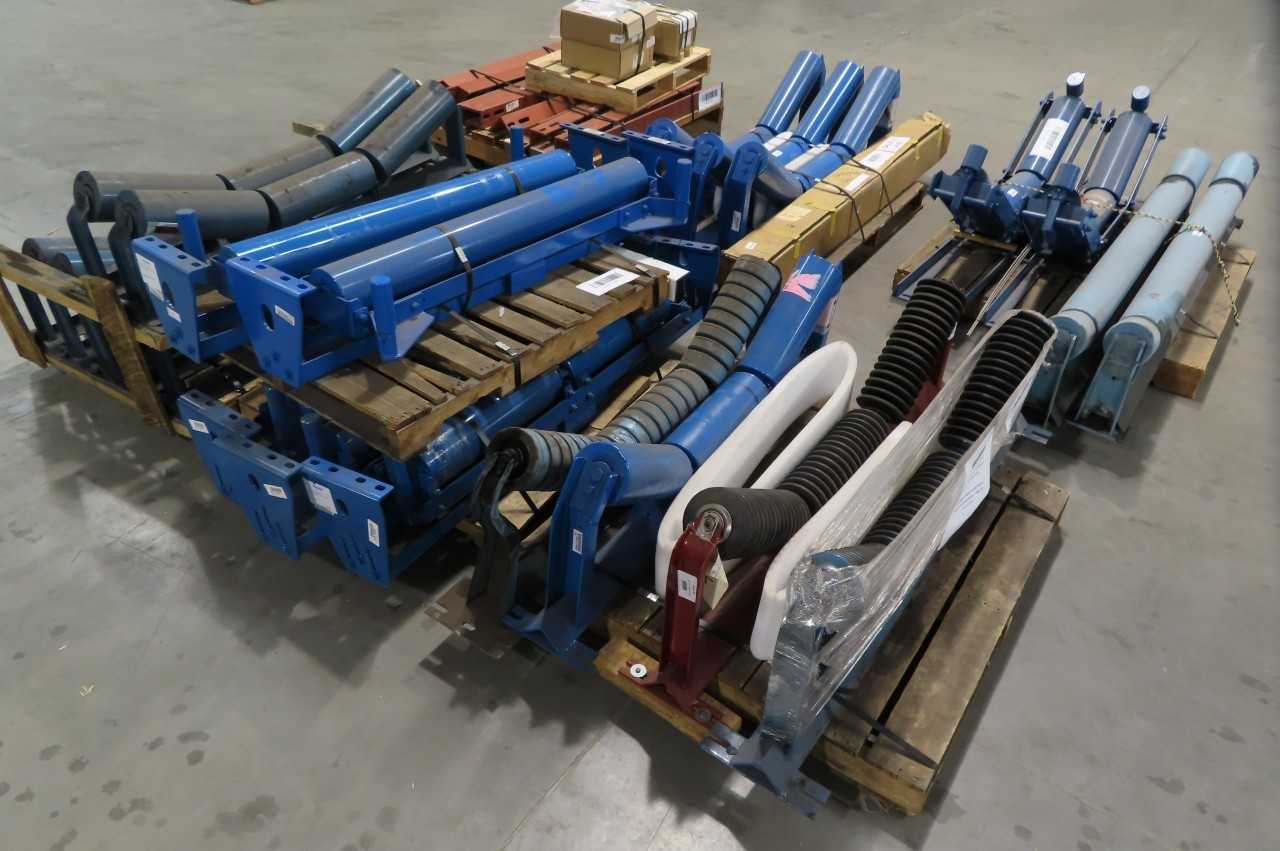 9 PALLETS OF ASSORTED WIDE SETTING TROUGHING IMPACT ROLLER IDLERS WITH REPLACEMENT PARTS, FALK HUBS, HEWITT ROBBINS, SAGUARD - GEAR REDUCERS