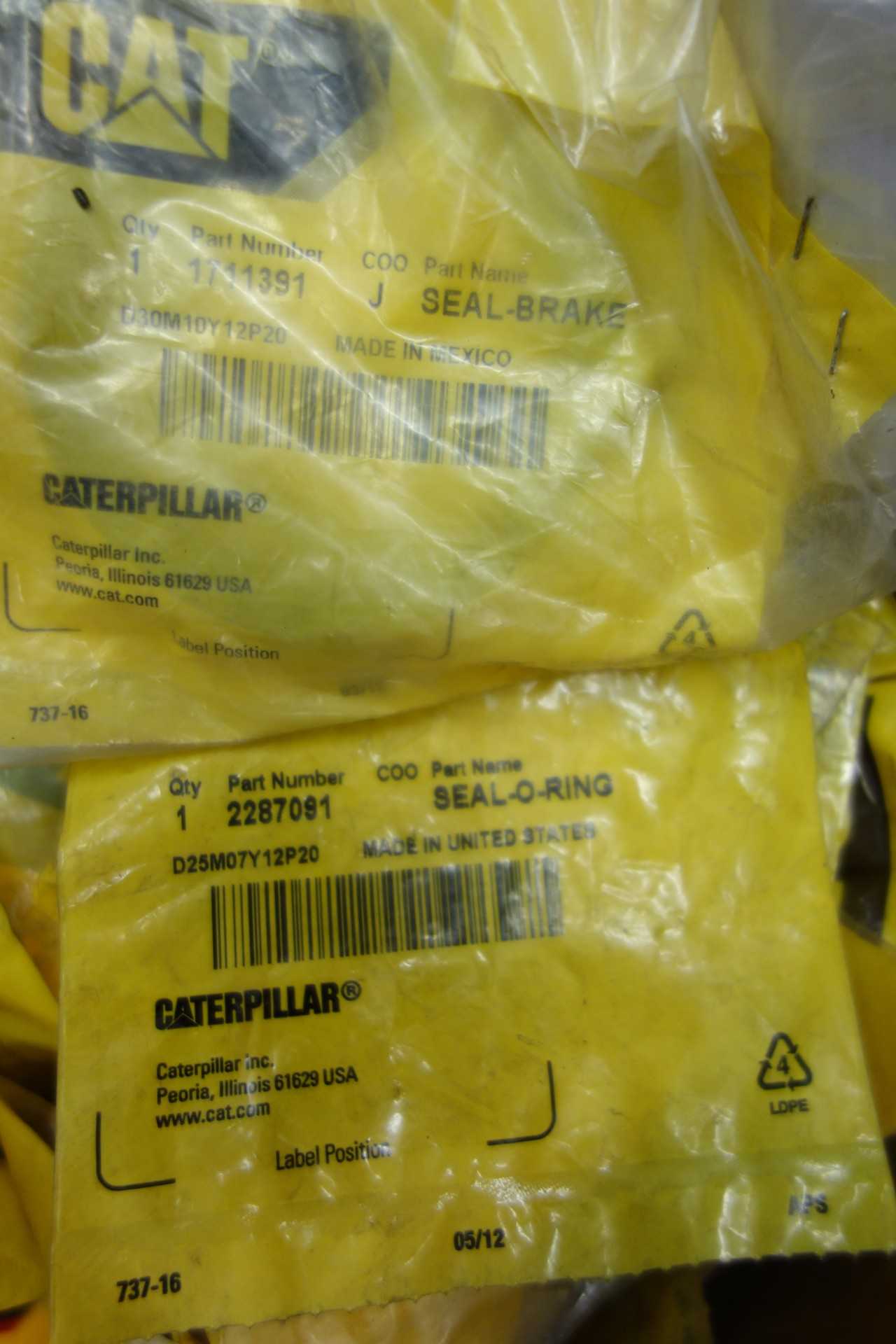 PALLET OF ASSORTED CAT HEAVY EQUIPMENT REPLACEMENT PARTS - CONSTRUCTION