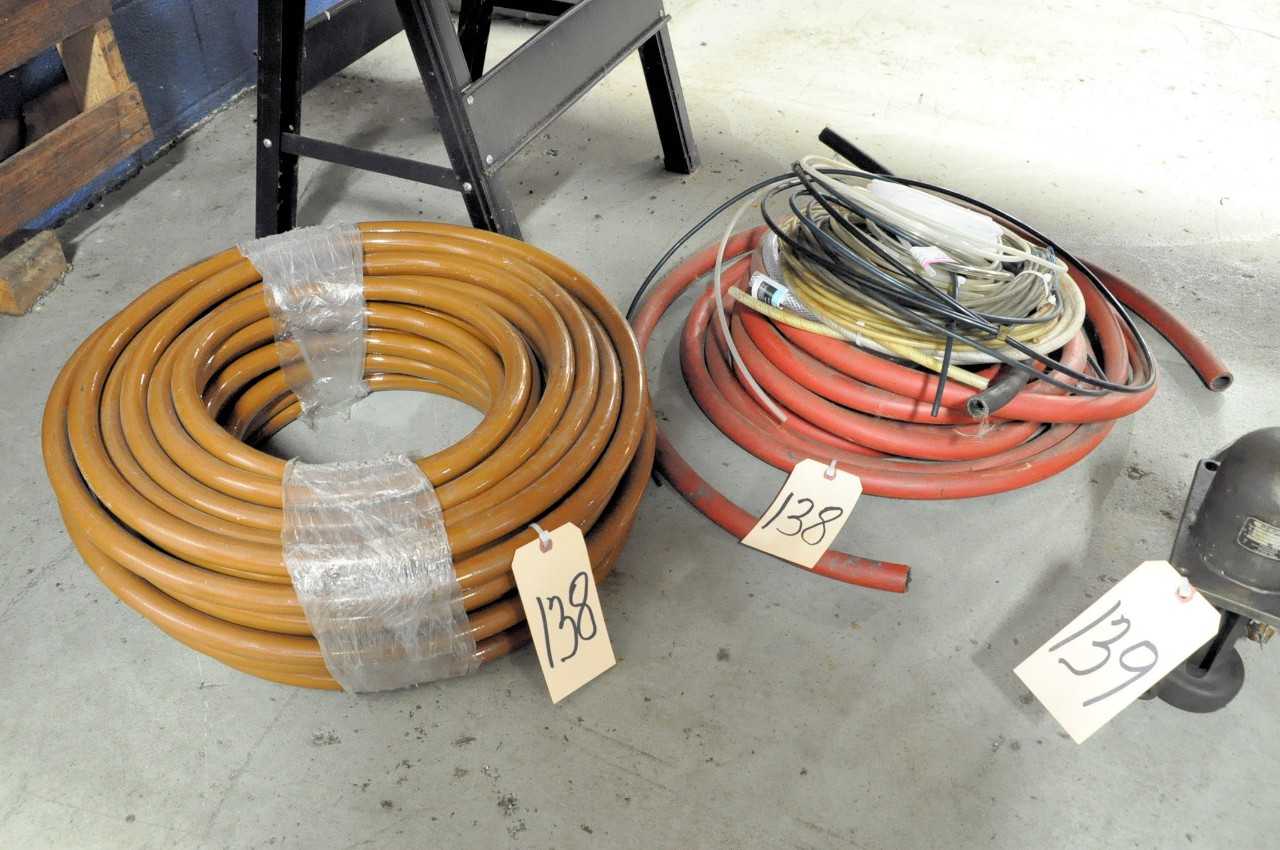 Lot Various Hoses in 2 Stacks Under Table - ELECTRIC POWER TOOLS