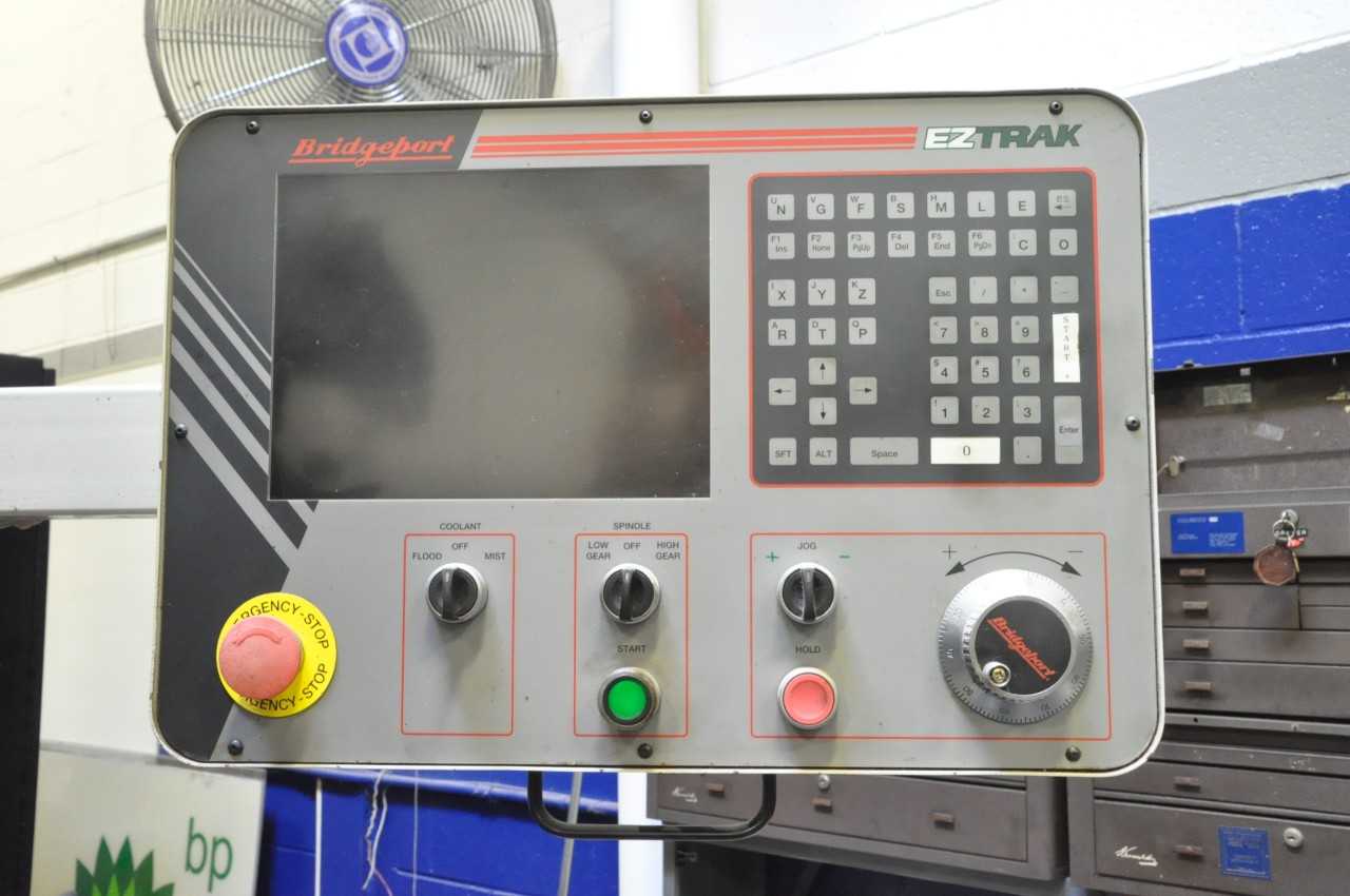 Bridgeport EZ Trak CNC 2-HP Variable Speed Vertical Milling Machine, S/n BR284943E, Bridgeport EZ Trak CNC Controller, 9" x 48" Power Feed Table, 7" Riser, Quick Change Tooling Holder, Work Light - CNC MACHINING CENTERS