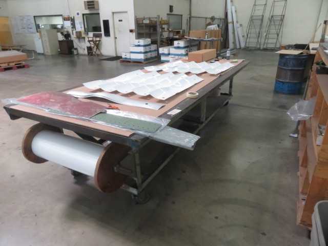 Work table on wheels, 195" X 55" - MISCELLANEOUS