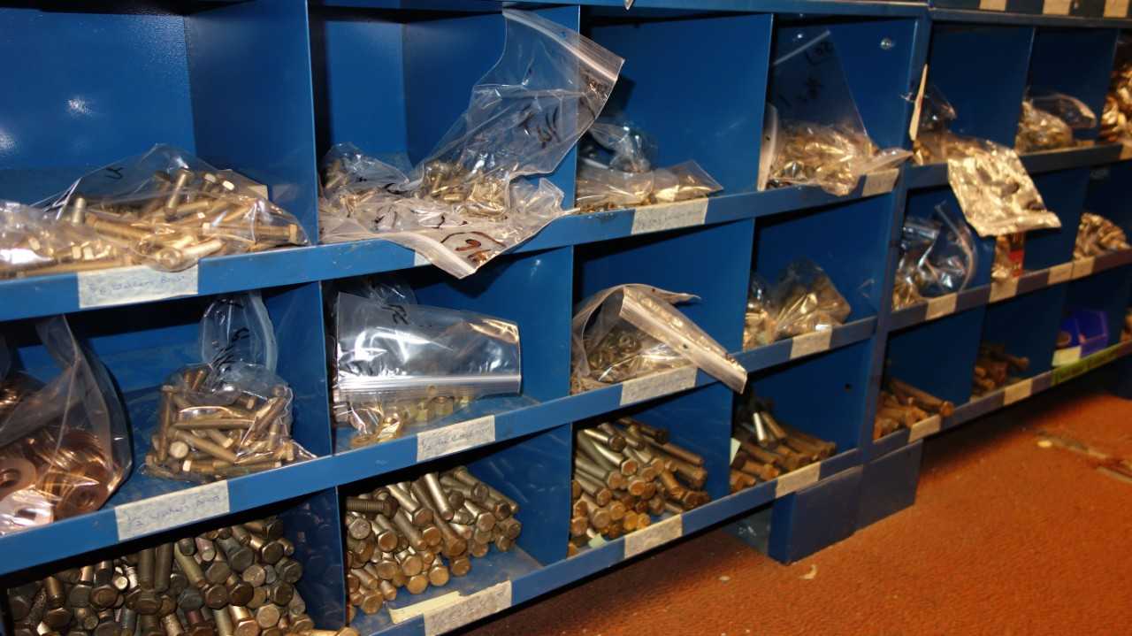 CONTENTS OF 2X STACKED PIGEON HOLE CABINETS, ASSORTED BRASS HARDWARE - INDUSTRIAL PARTS