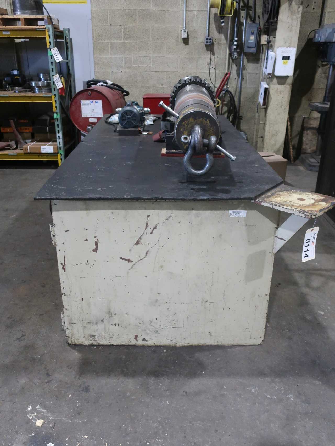 Steel work table 4'x8' with contents (hydraulic pump and large shaft not included) - MATERIAL HANDLING