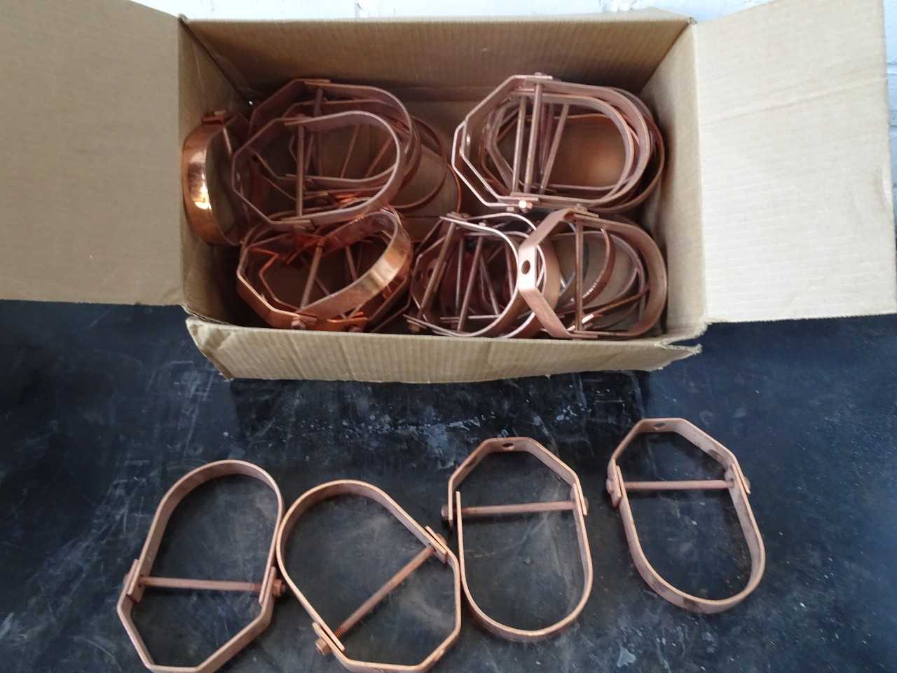 Appox 25 3in copper pipe hangers - WIRE MANUFACTURING