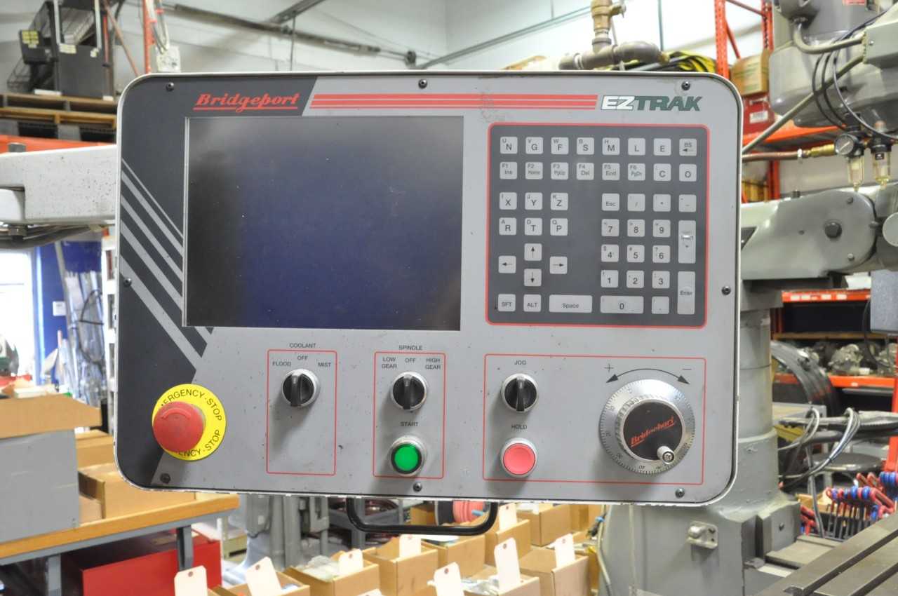 Bridgeport EZ Trak CNC 2-HP Variable Speed Vertical Milling Machine, S/n BR284945E, Bridgeport EZ Trak CNC Controller, 9" x 48" Power Feed Table, 7" Riser, Quick Change Tooling Holder, Work Light - CNC MACHINING CENTERS