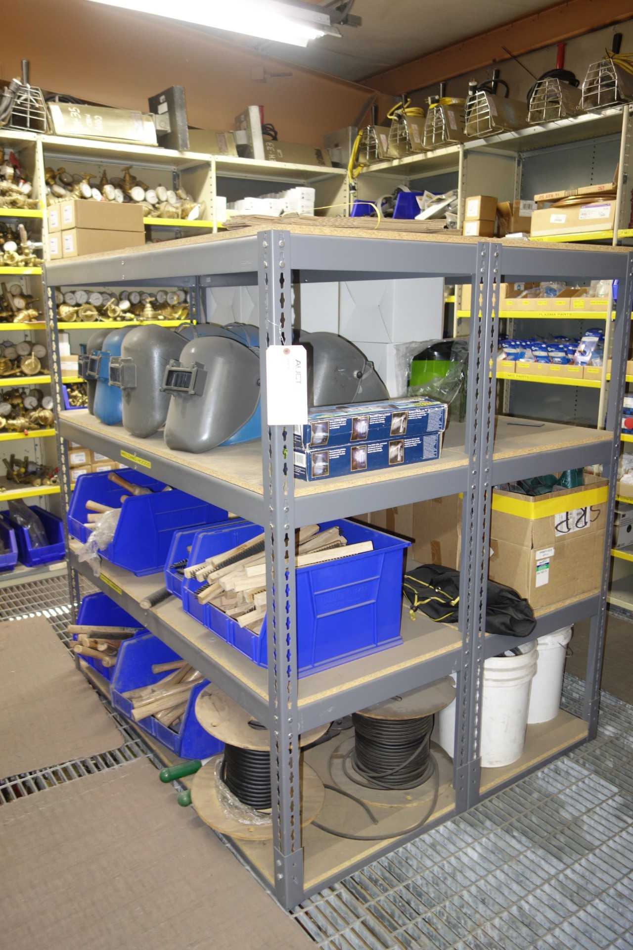 Contents of racking - assorted welding hoods, brushes, hammers, wire - HAND TOOLS