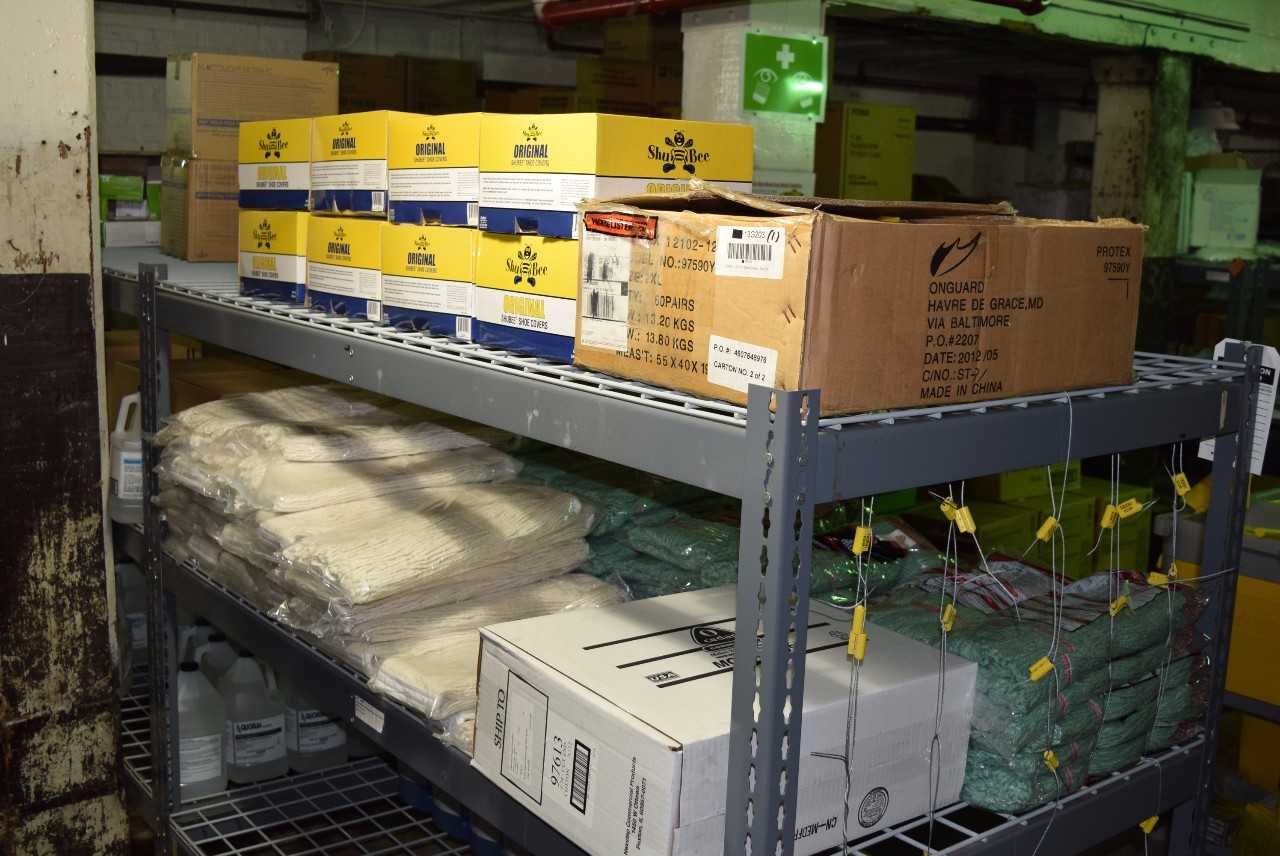 CONTENTS OF SHELVES - MOP HEADS AND SHOE COVERS - MISCELLANEOUS