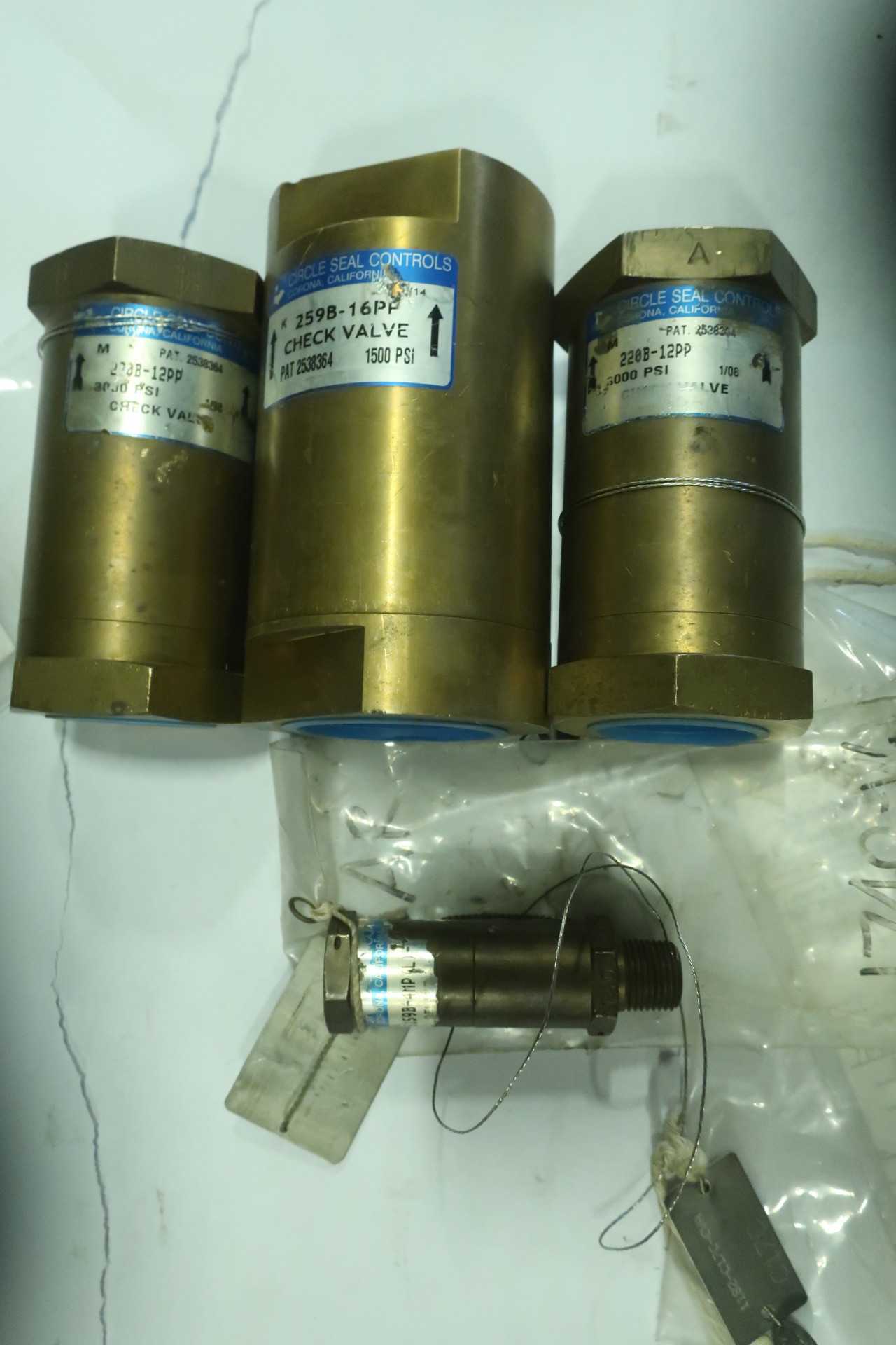 LOT OF 4 ASSORTED CHECK VALVES - CHECK VALVE