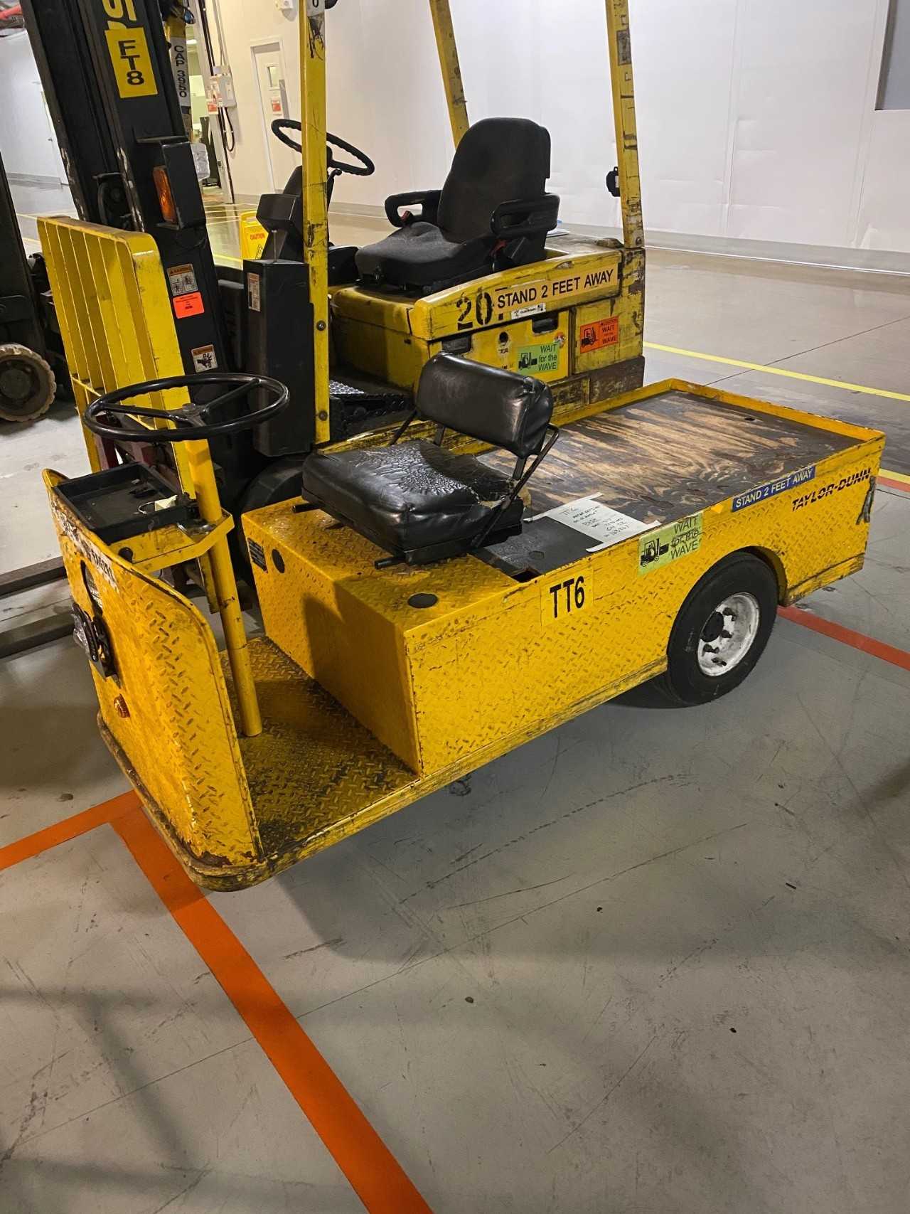 Taylor Dunn 3 Wheel Tugger - MATERIAL HANDLING Taylor Dunn 3 Wheel Tugger - MATERIAL HANDLING
